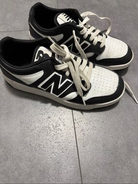 New Balance Black and White Low-Top Sneakers